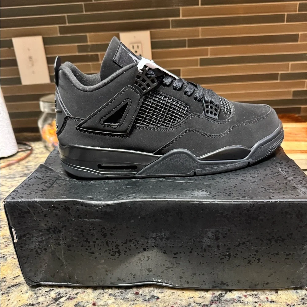Jordan 4 black cat (2025)